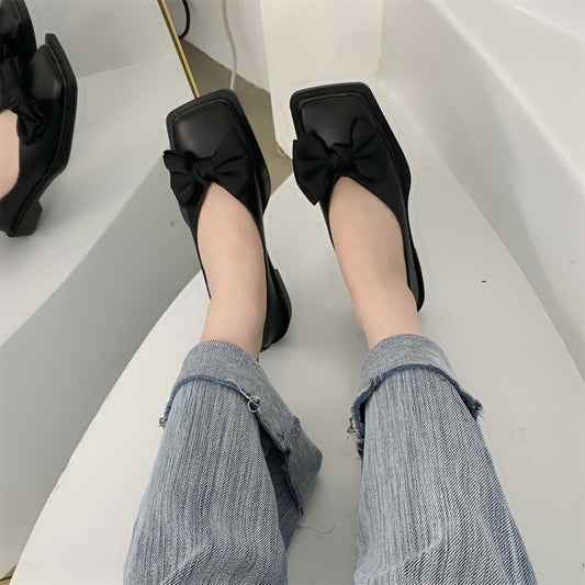 Scarpe basse con fiocco della minoranza francese
